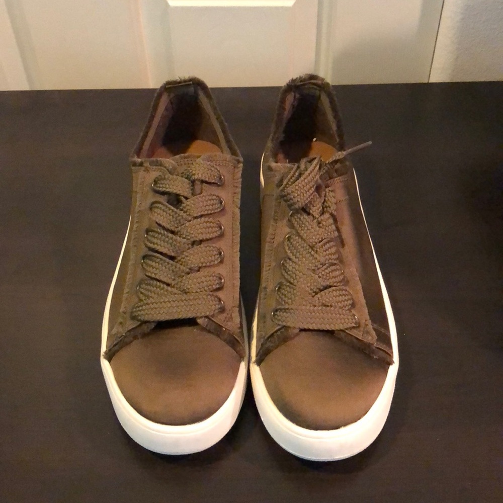 Size 10 pair of green sneakers.